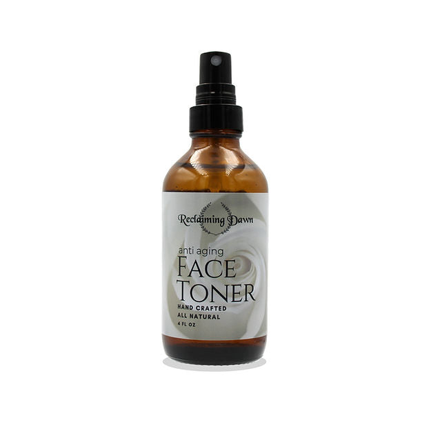 Bottle of Reclaiming Dawn face toner on a white background
