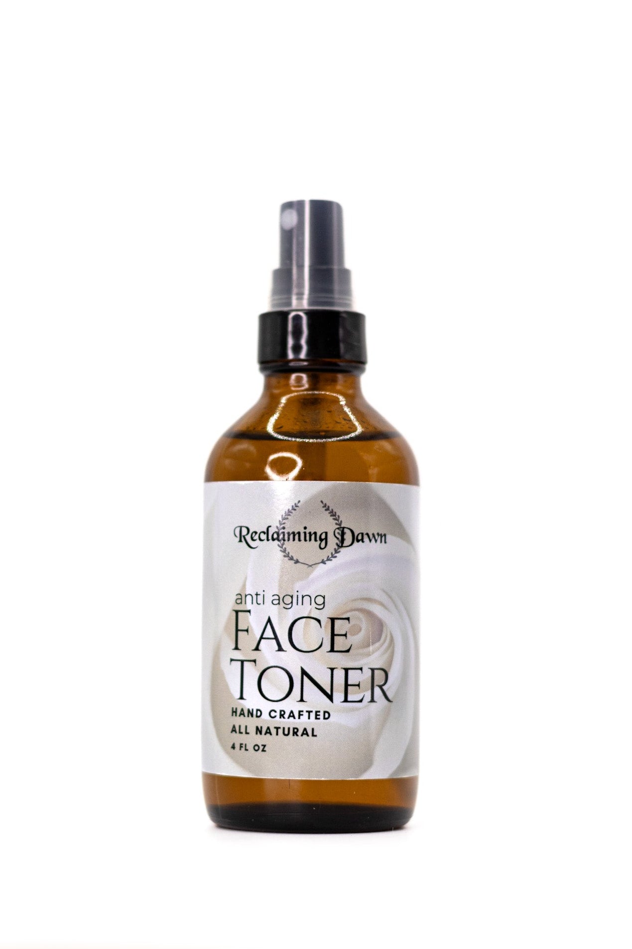 Bottle of Reclaiming Dawn face toner on a white background