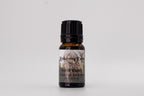 Bottle of 'Hair Envy' essential oil blend by Reclaiming Beauty on a light gray background