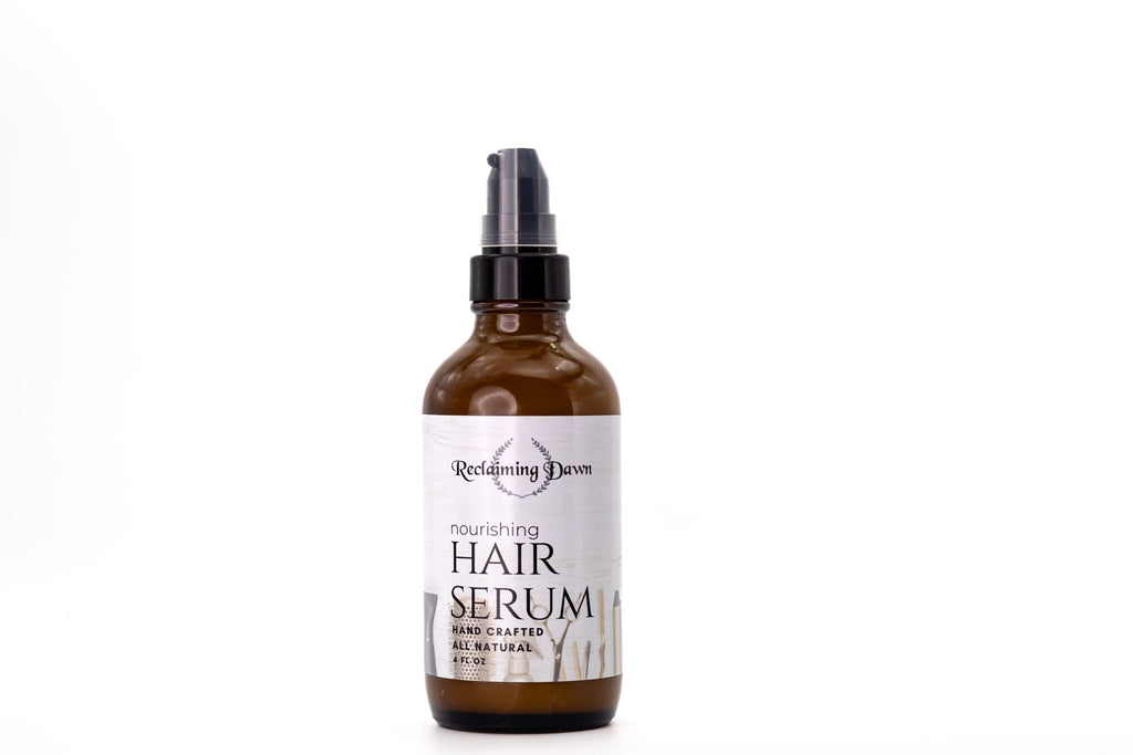 Hair serum bottle with label on a white background