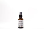 Bottle of Acne Spot Treatment on a white background